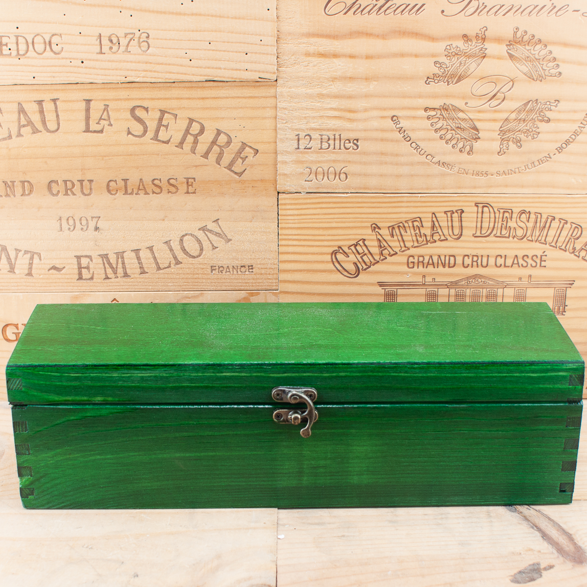 Cassetta di legno verde per una bottiglia 